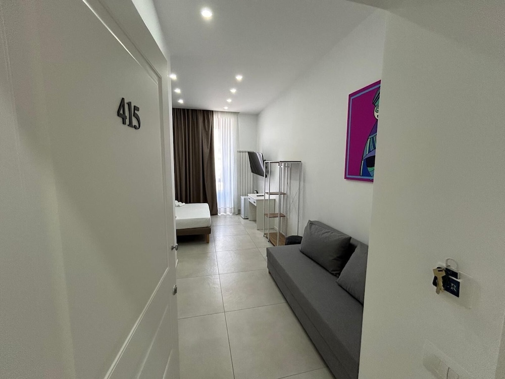 Comfort Quadruple Room, City View