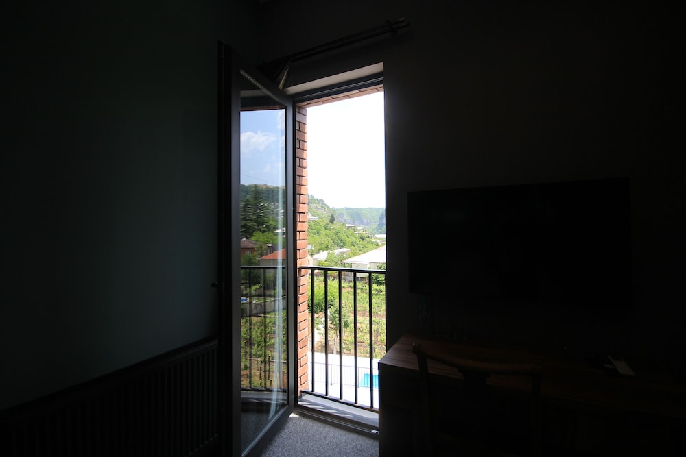 Deluxe Double Room, Multiple Bedrooms, Balcony, Hill View photo 2