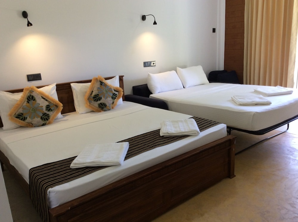 Family Quadruple Room, Multiple Beds, Non Smoking, Garden View photo 3