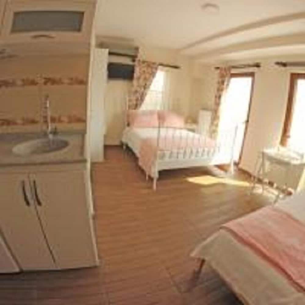 Deluxe Triple Room, Multiple Beds, Garden View photo 3