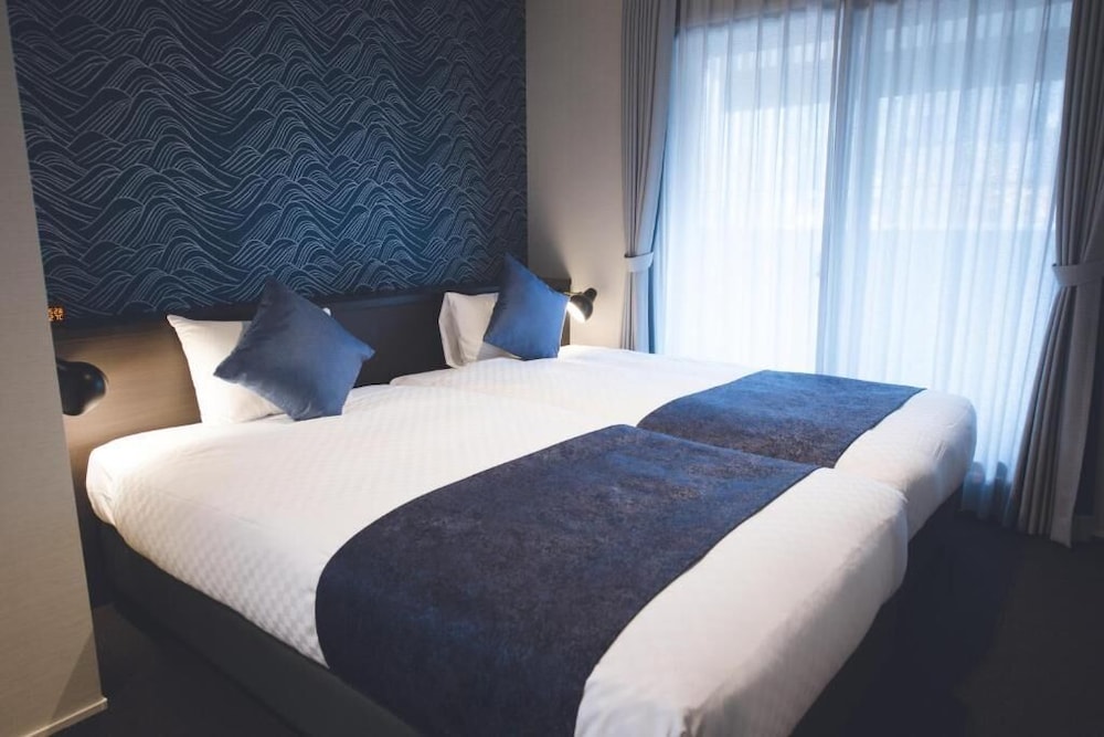 Luxury Twin Room - Photo 10