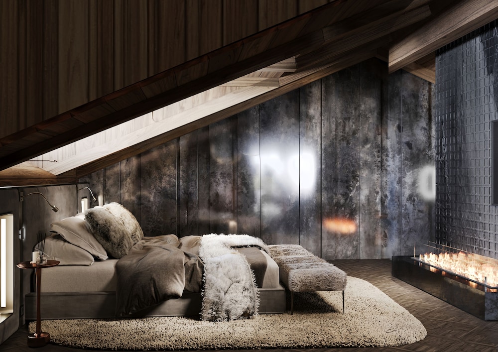 Suite open space with Dolomites view, whirlpool bath and sofa bed