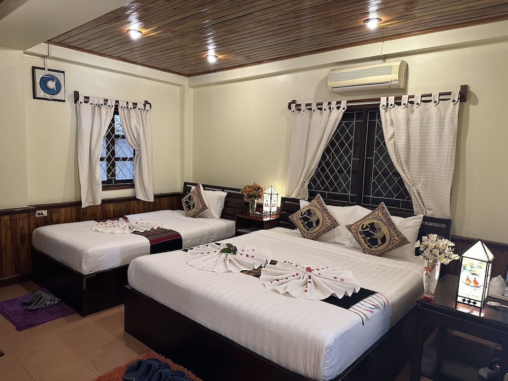 Deluxe Triple Room - Photo 24