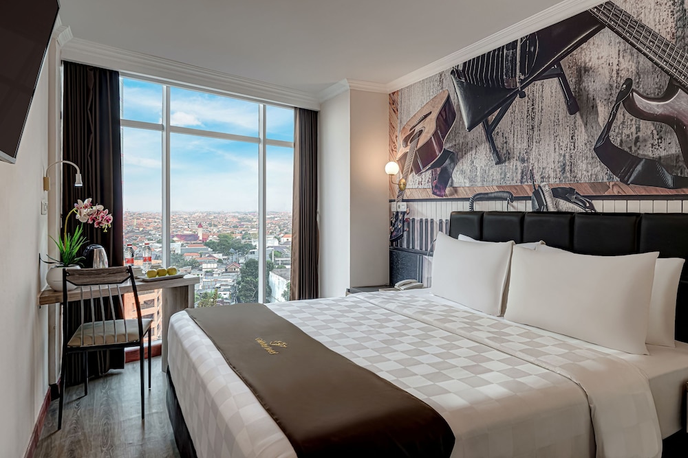 Deluxe Room - Photo 1