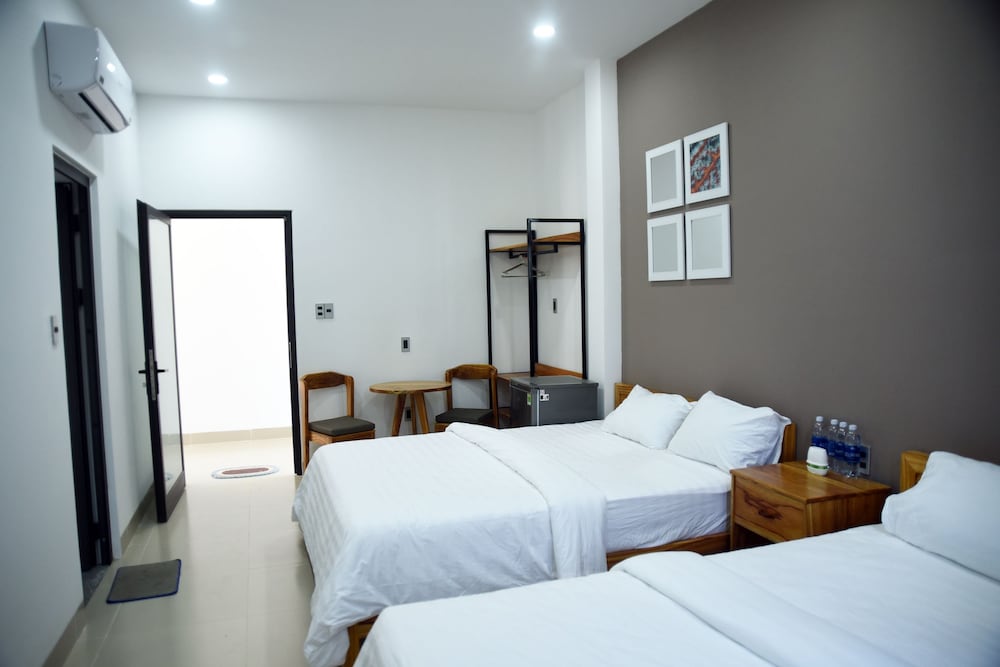 Deluxe Triple Room, Multiple Beds, Beach View