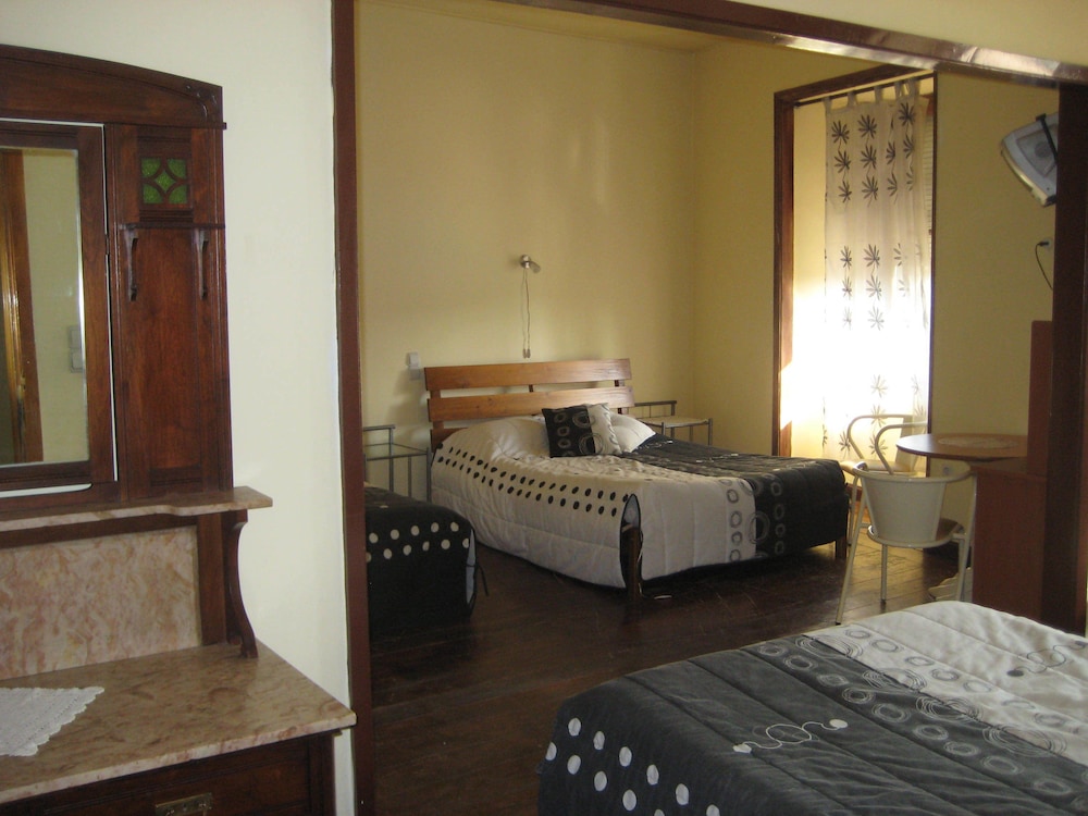 Habitación Cuádruple Clásica con Baño Privado