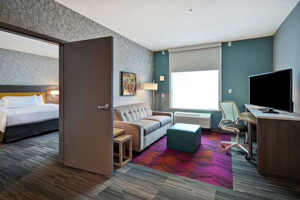 Suite, 1 King Bed, Accessible (Mobility & Hearing, Roll-in Shower) - Photo 1