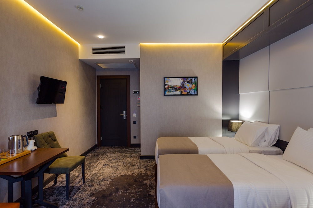 Deluxe Twin Room - Photo 11