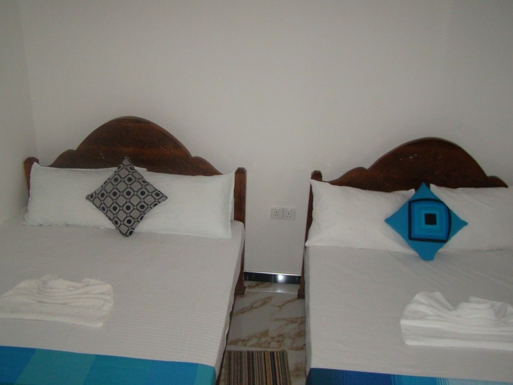 Deluxe Twin Room, 3 Bedrooms, Garden View photo 2