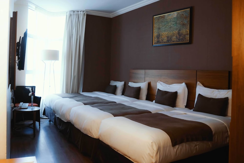 Deluxe Quadruple Room - Photo 4