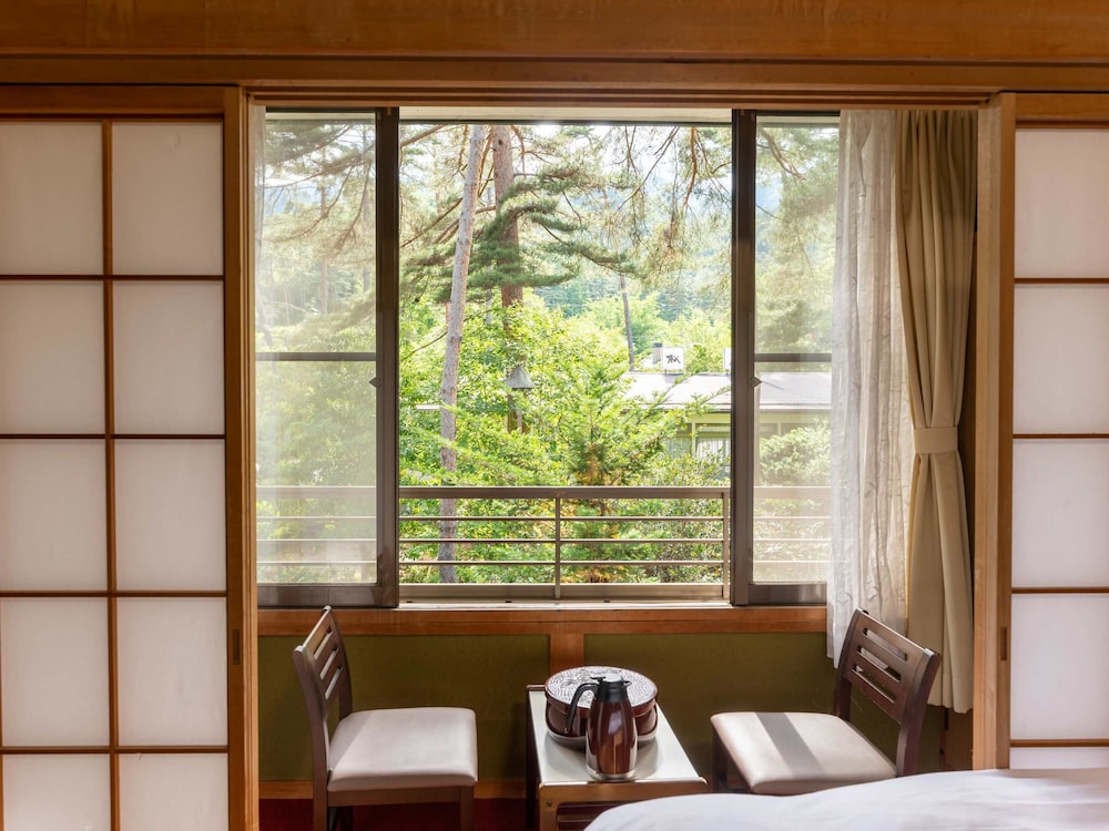 Deluxe Room, Shared bathroom and toilet, Non Smoking, Garden View