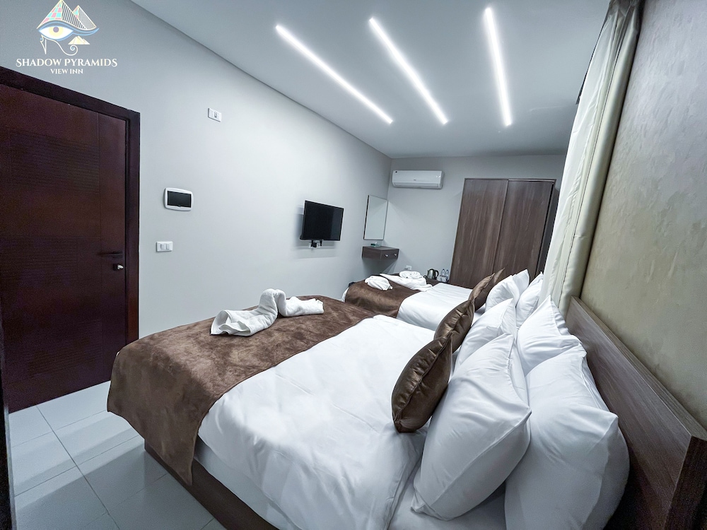 Standard Quadruple Room, 2 Queen Beds photo 2