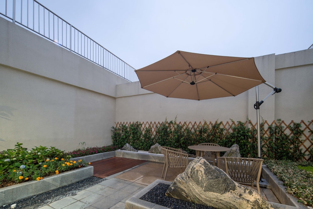 Suite, 1 King Bed, Garden View - Photo 1