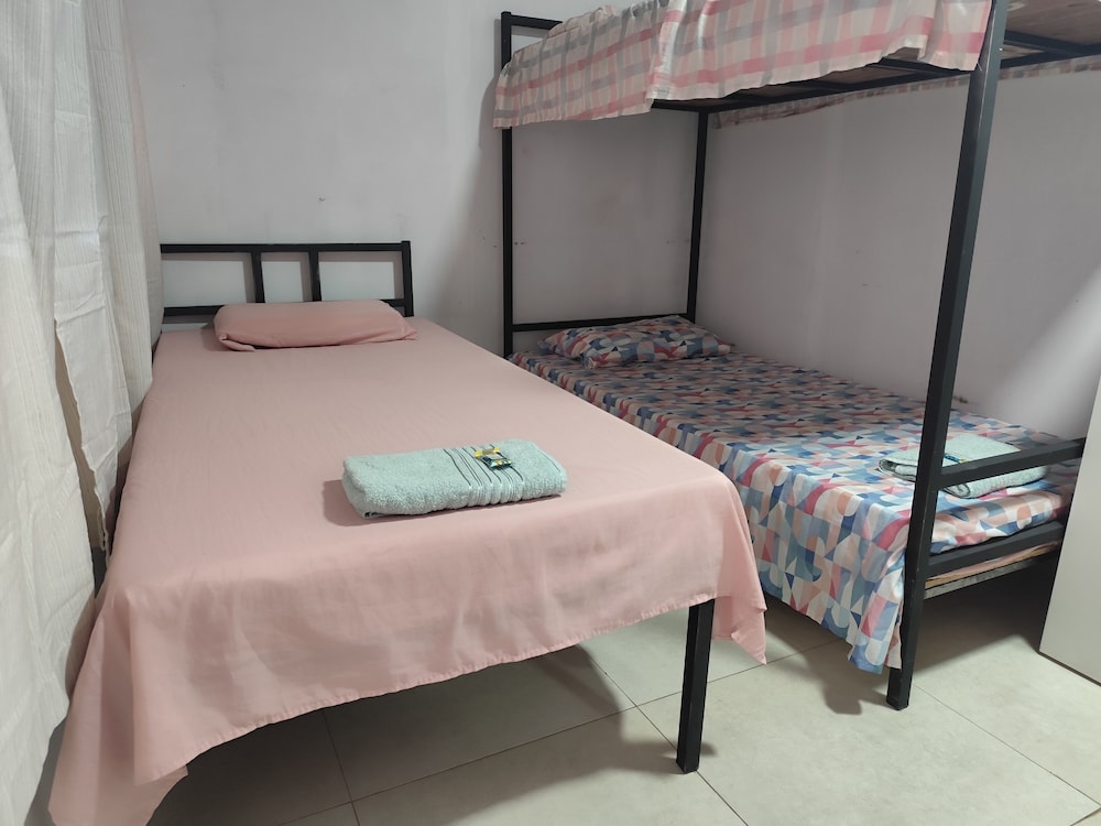 Economy Triple Room, Garden View photo 1
