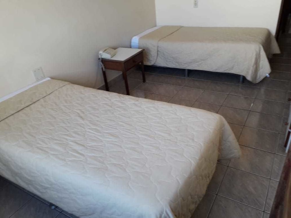 Quarto Duplo Com Ar Condicionado