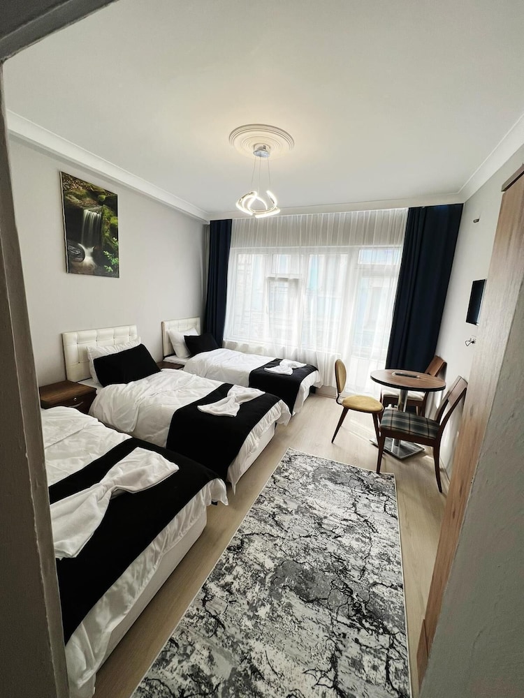 Deluxe Triple Room, Balcony photo 1