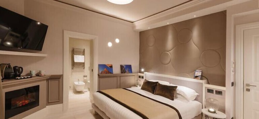 Deluxe Triple Room, Fireplace photo 1