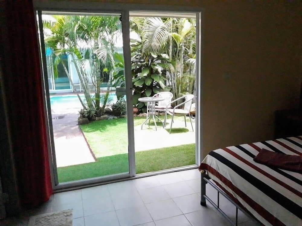 Garden Or Pool View With Fan photo 2