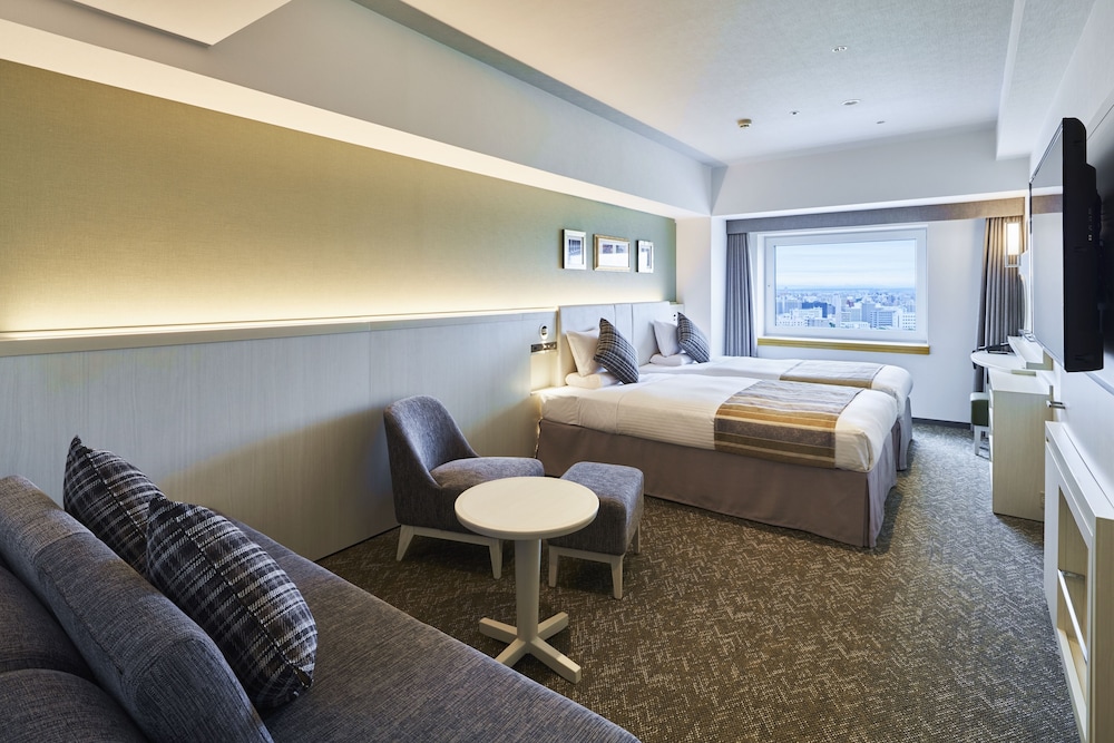 Family Comfort Twin Room, Non Smoking (Eco Plan-No Cleaning Service) - Photo 1