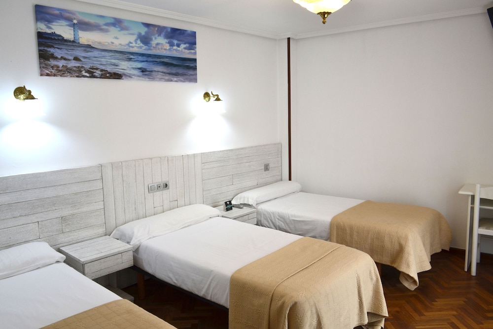 Triple Room - Photo 1