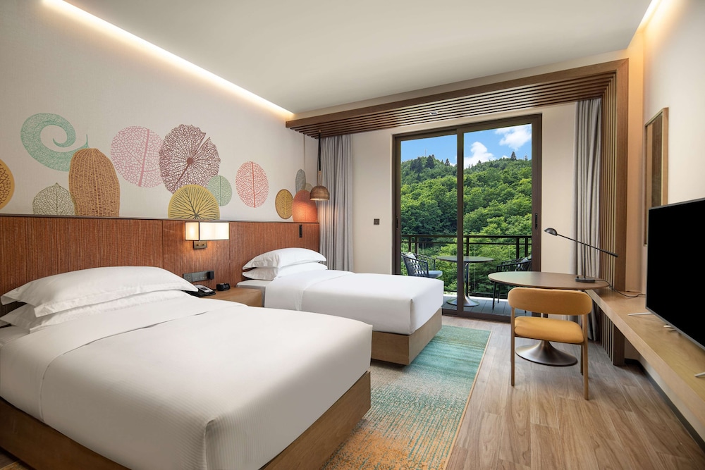 Deluxe Room, Multiple Beds, Balcony - Photo 1