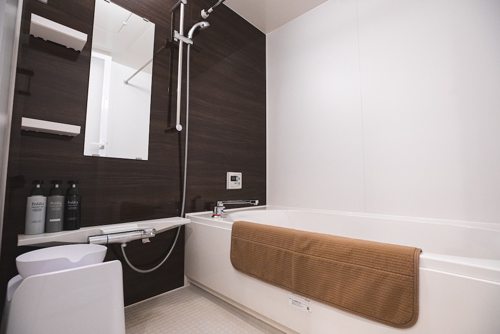 Deluxe Triple Room - Photo 8