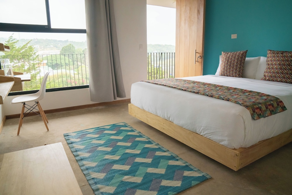 Deluxe Triple Room, Patio, City View
