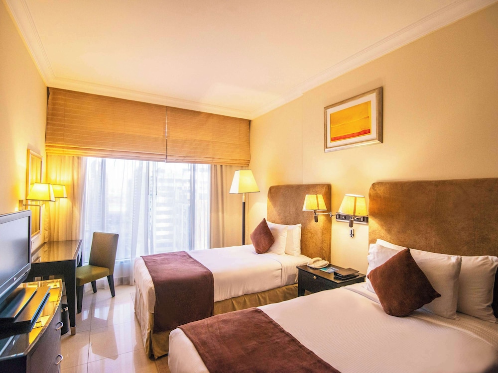 One-Bedroom Apartment City View Twin Bed with Free Shuttle Beach Transfer, Next to Metro Station photo 1