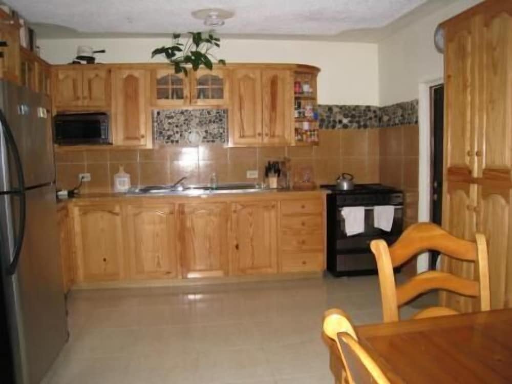 Cottage Deluxe, coin cuisine, vue fleuve