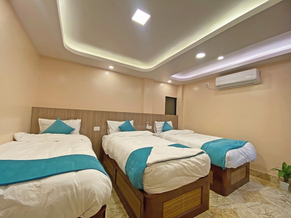 Deluxe Triple Room - Photo 8