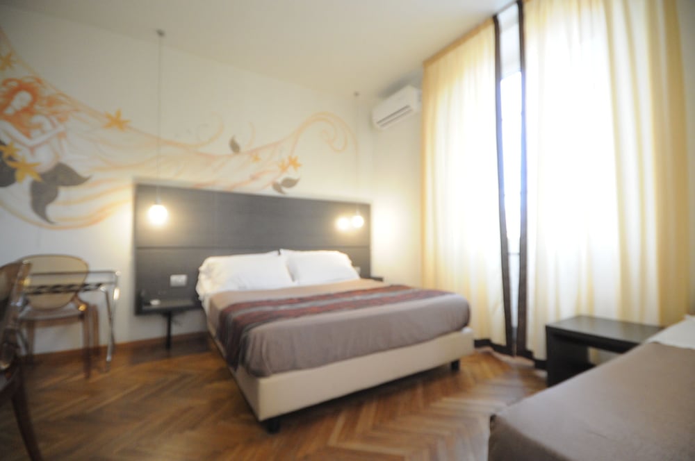Triple Room - Photo 1