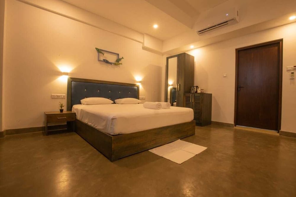 Deluxe Triple Room - Photo 1