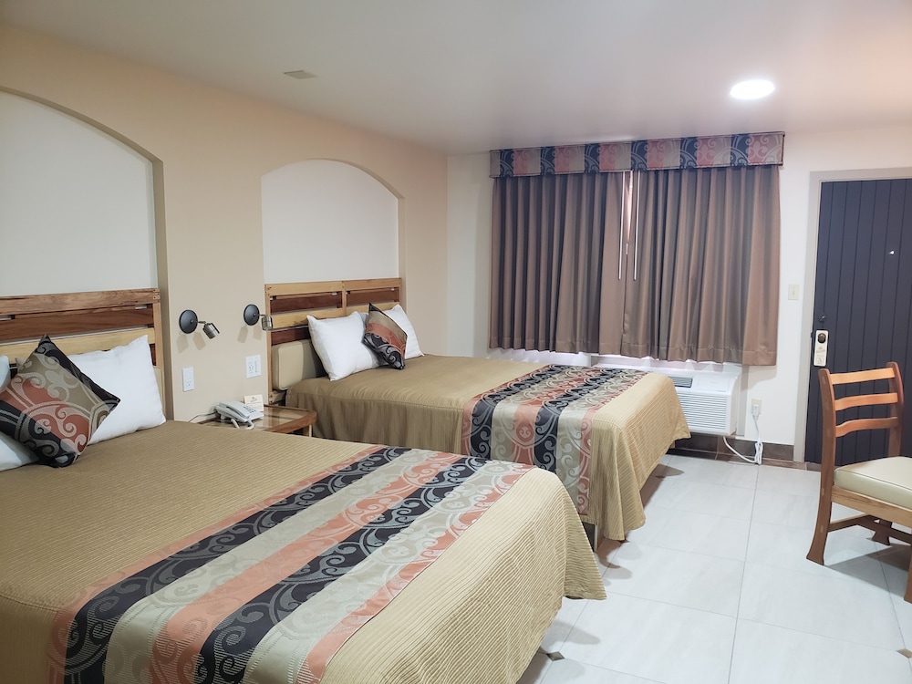 Deluxe Quadruple Room - Photo 2
