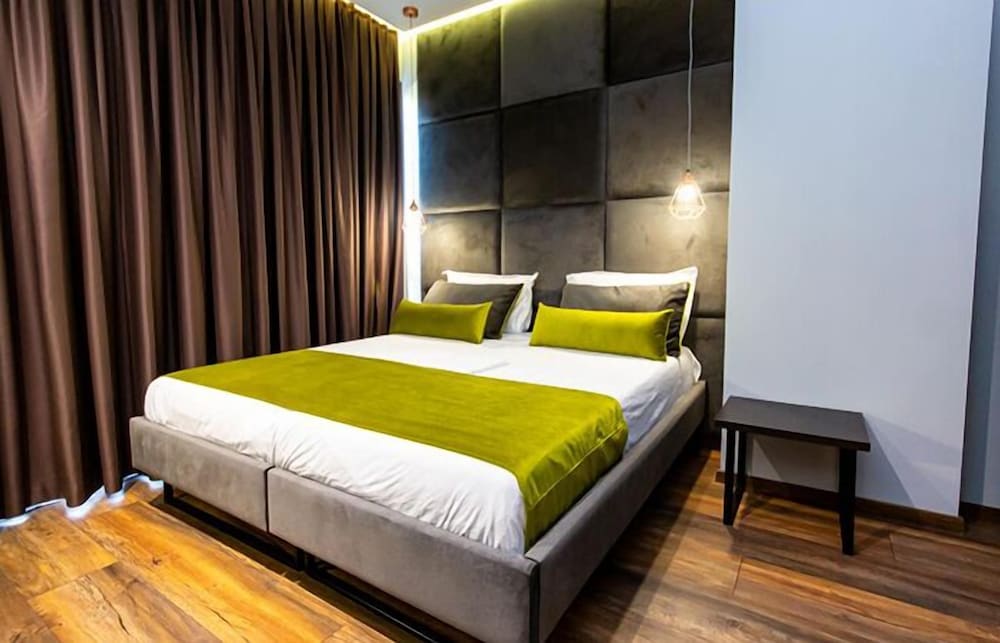 Deluxe Quadruple Room, Balcony, Ground Floor