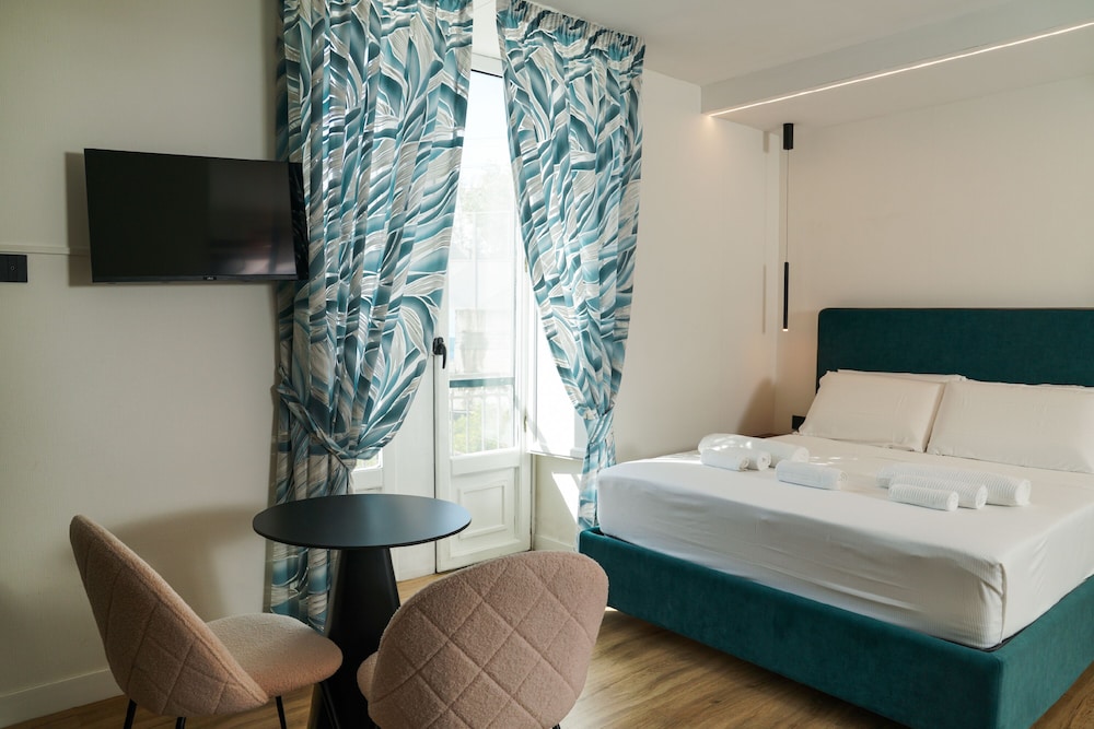 Deluxe Triple Room - Photo 1