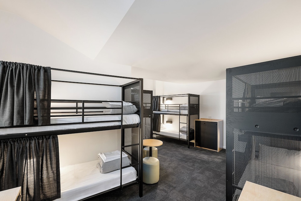 Bed in 8-Bed Male Dormitory with Shared Bathroom