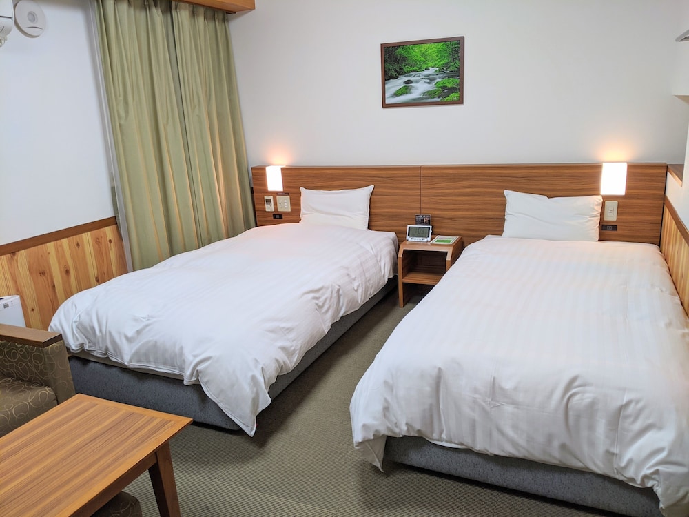 Deluxe Twin Room (27.7-31.2 Sqm) W/4 nights Non Smoking(No cleaning) - Photo 1