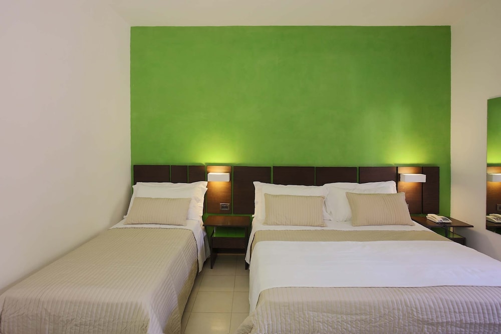 Triple Room, Balcony, Garden View - Photo 1