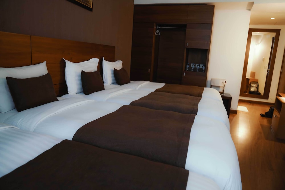 Deluxe Quadruple Room - Photo 3