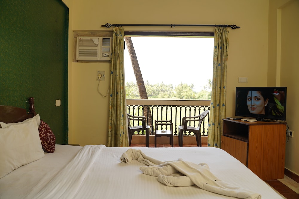 Deluxe Room - Photo 4