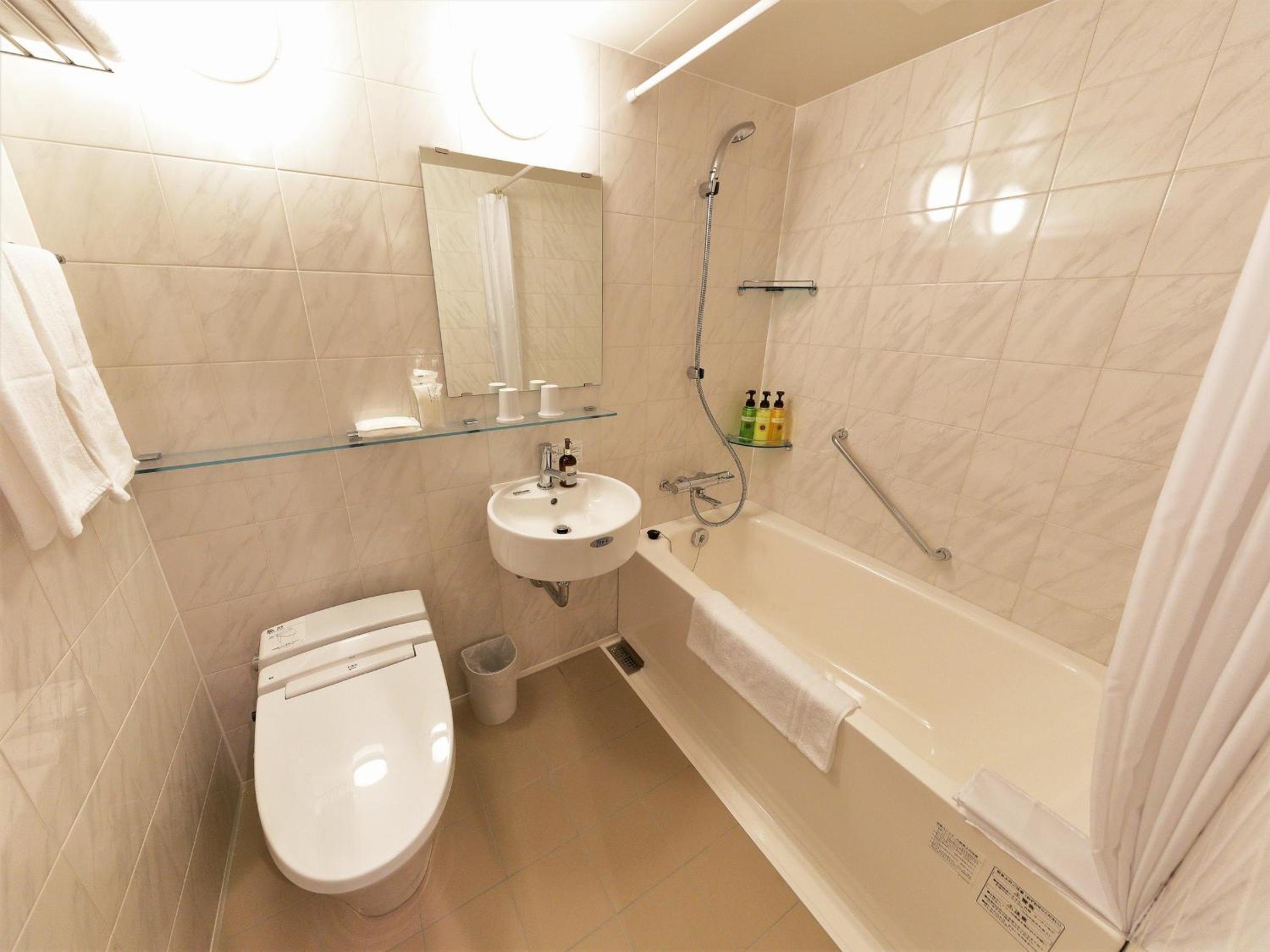 Standard Twin Room - Non-Smoking - Weekly Plan(Cleaning one a week) photo 3