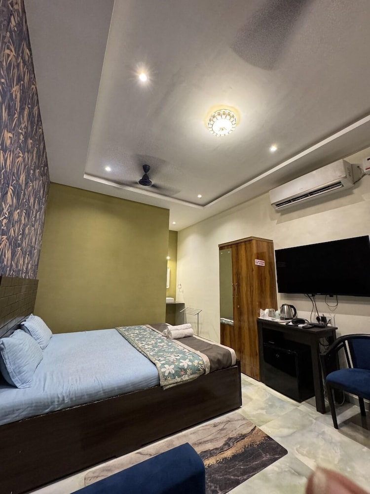 Deluxe Quadruple Room, Garden View