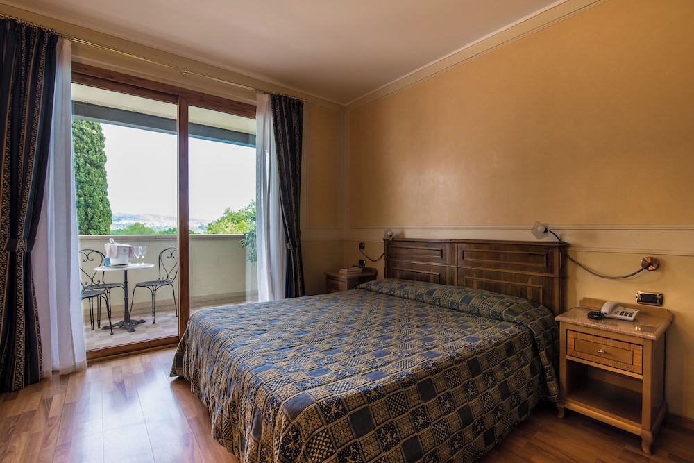 Superior Triple Room, Balcony (or terrace)