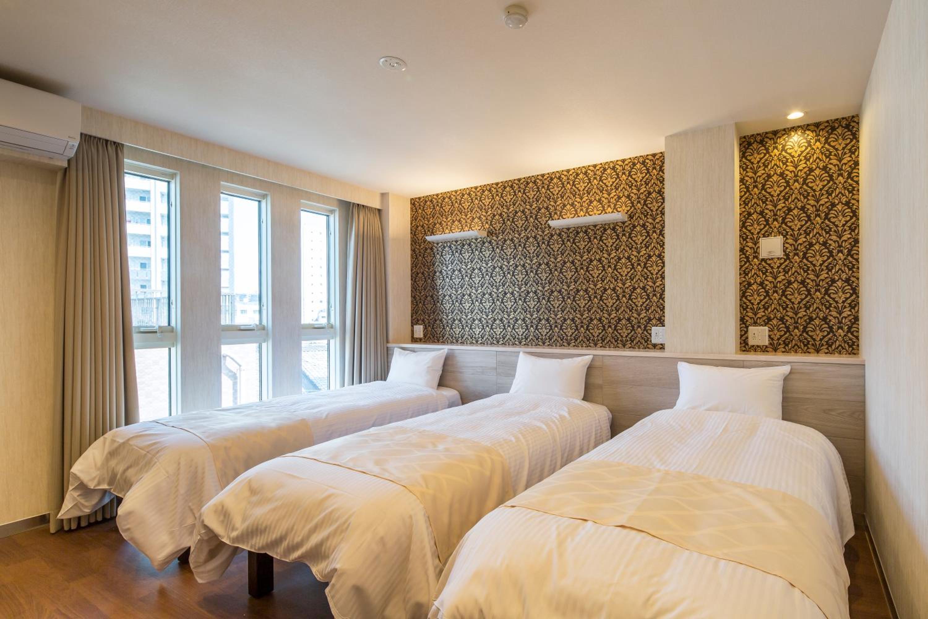 Two-Bedroom with Balcony (5 Adult) photo 1