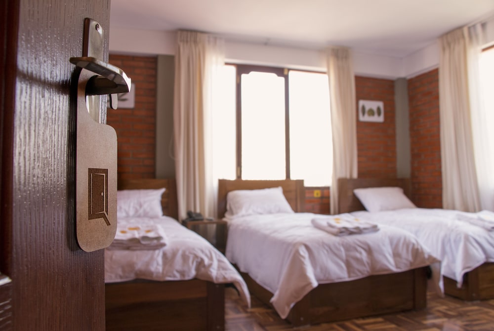 Deluxe Triple Room, 3 Twin Beds, City View photo 1