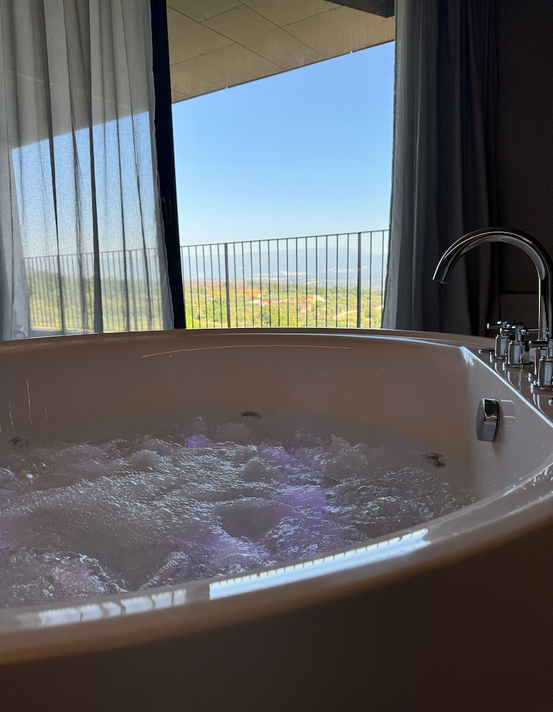 Suite with Balcony and Interior Jetted Tub with Mountain View photo 2