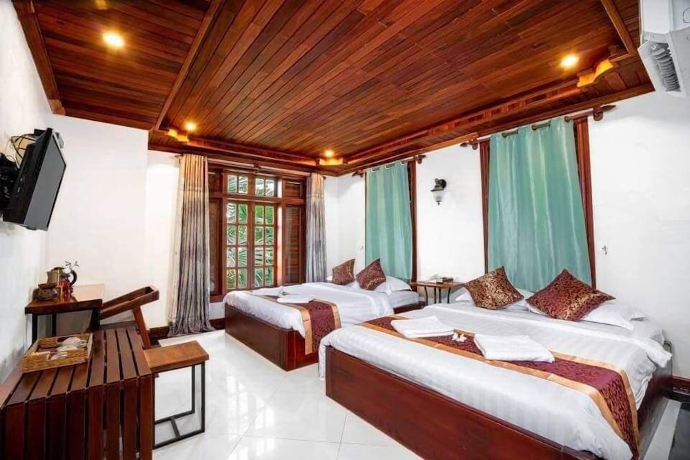 Deluxe Quadruple Room - Photo 1