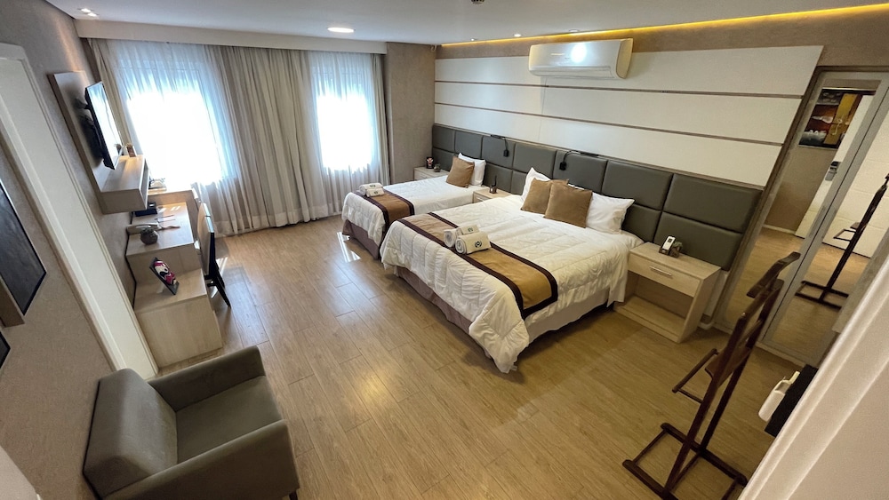 Quarto Luxo Triplo, tipo de camas