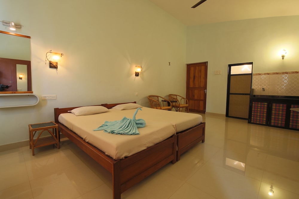 AC Twin Room with Balcony Upper Floor photo 2