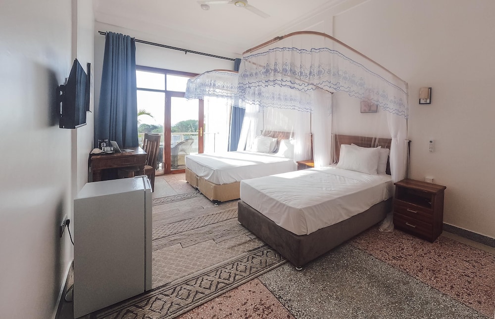 Deluxe Triple Room, Patio, Garden View